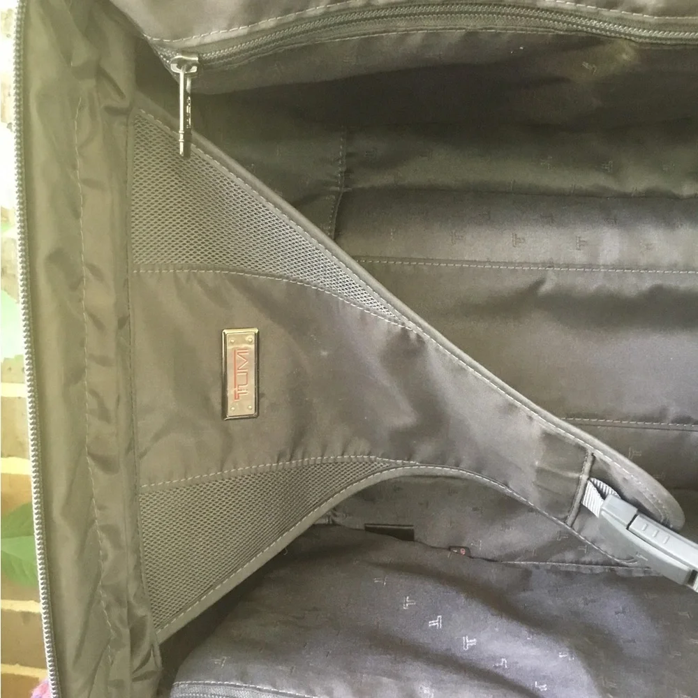 Tumi Black Men's Rolling Carry-On Travel Bag
